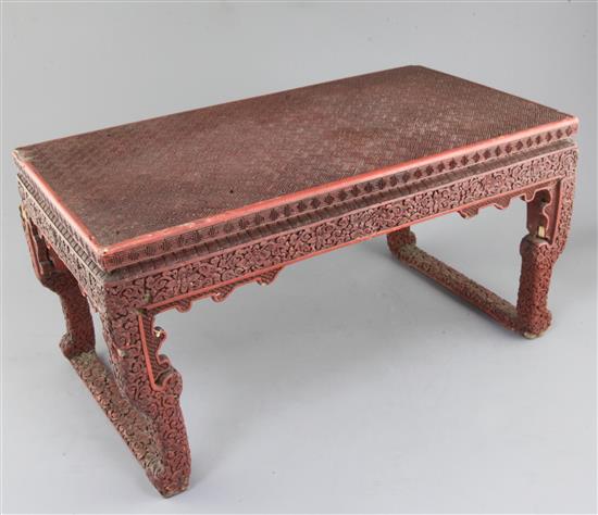 A Chinese cinnabar lacquer small table, 18th / 19th century, W.8cm D.26cm H.25cm